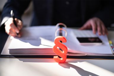 Foto: Mappe mit Paragraph Symbol